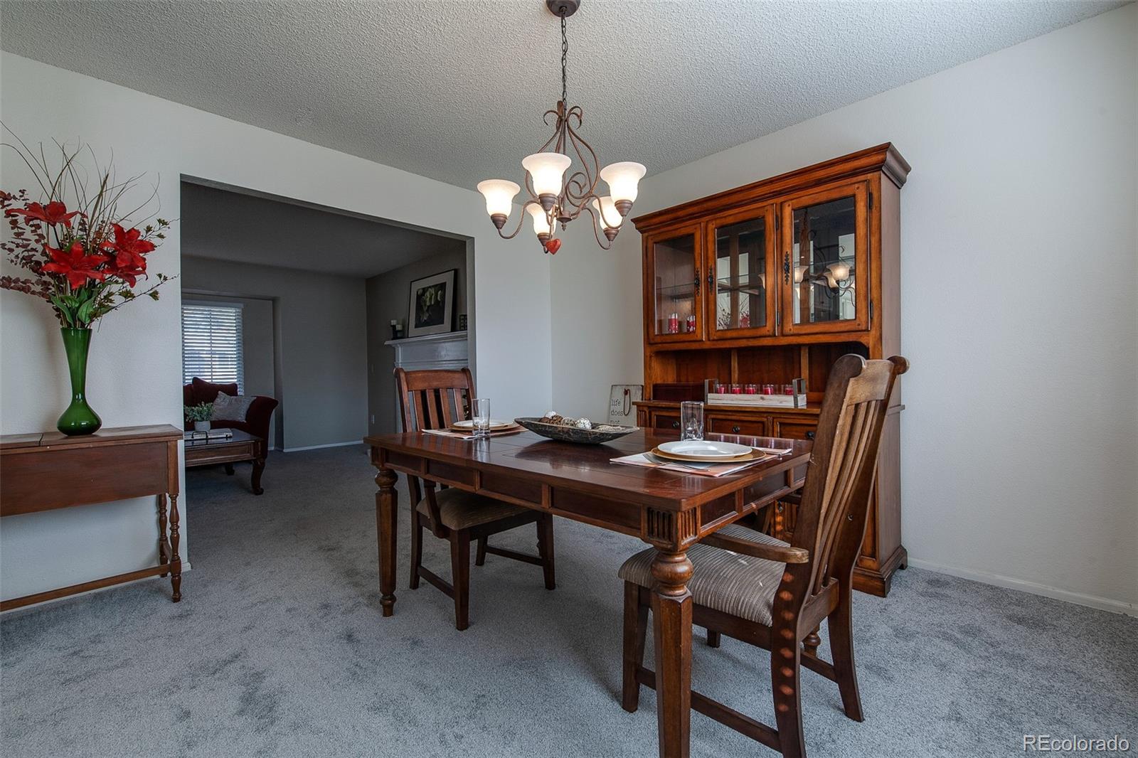 462 Mountain Chickadee Road Highlands Ranch, CO 80126 - Photo 7 of 37 a view of a dining room with furniture
