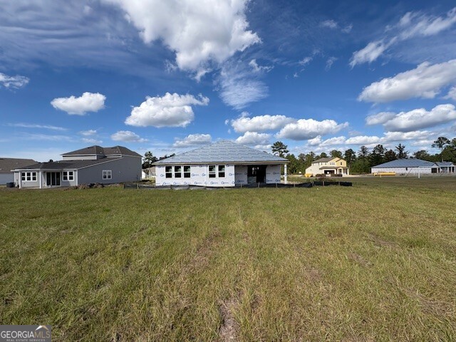 231 Park View Lane Kingsland, GA 31548 - Photo 9 of 22 a view of a big house with a big yard