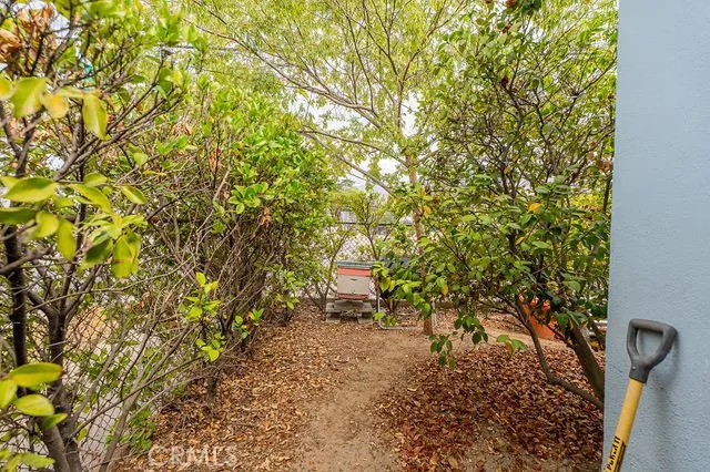 a kitchen with stainless steel appliances a stove a sink and a cabinets