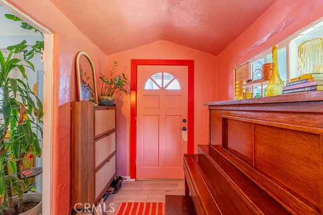 an aerial view of a residential apartment building with yard