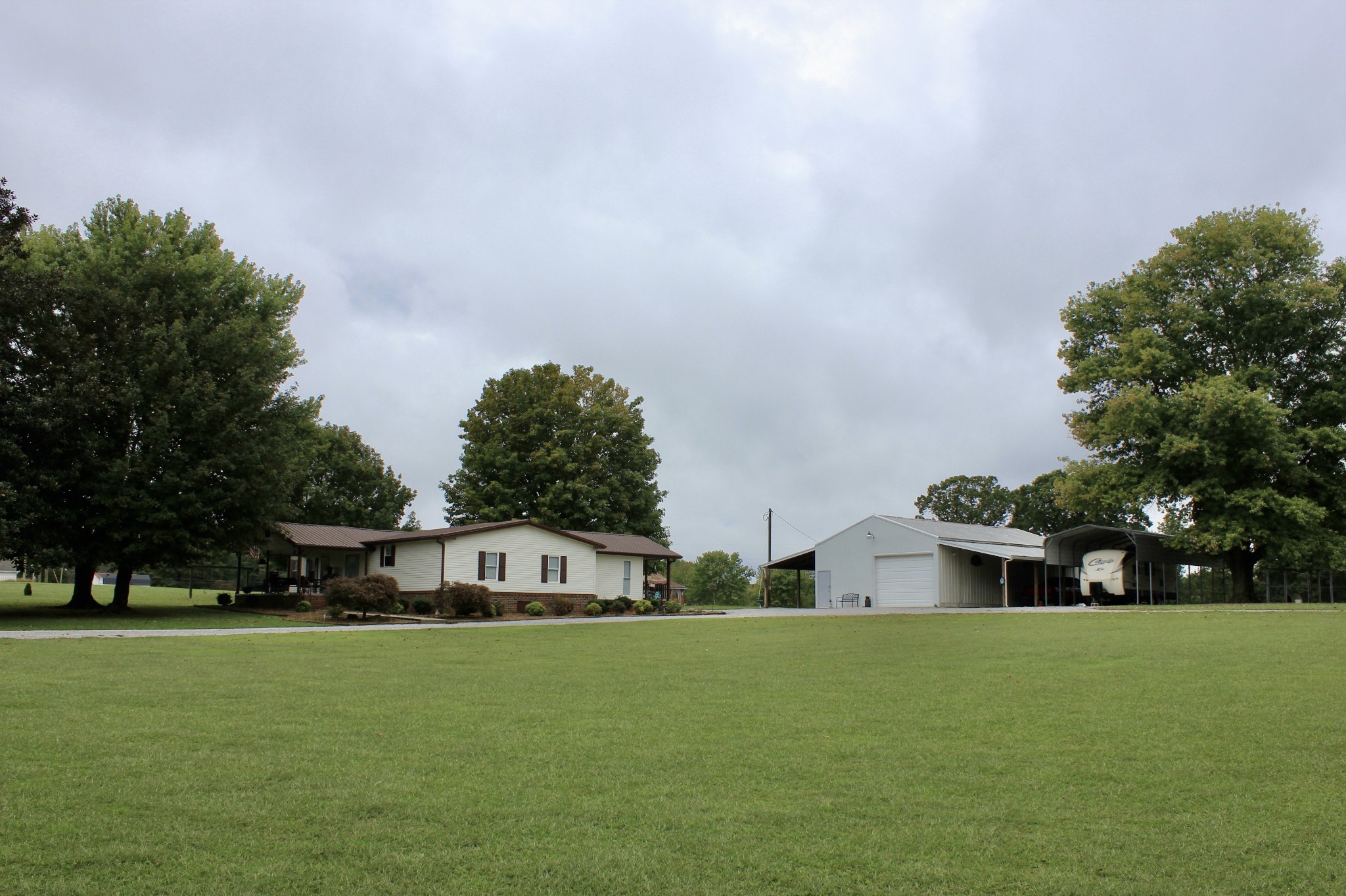 375 Nickajack Trail Monteagle, TN 37356 - Photo 14 of 34 a front view of a house with a garden