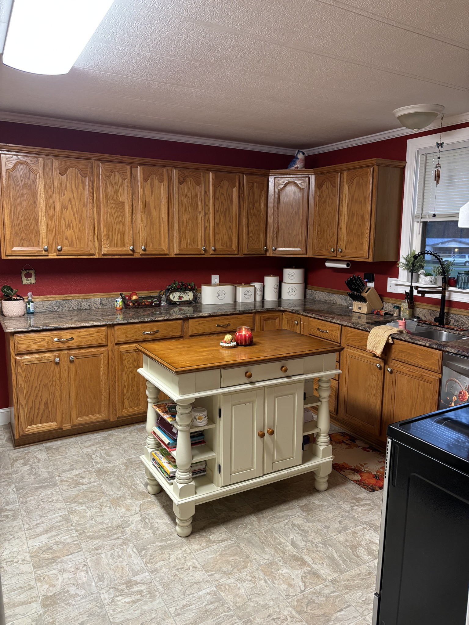 375 Nickajack Trail Monteagle, TN 37356 - Photo 19 of 34 a kitchen with a stove a sink and a refrigerator