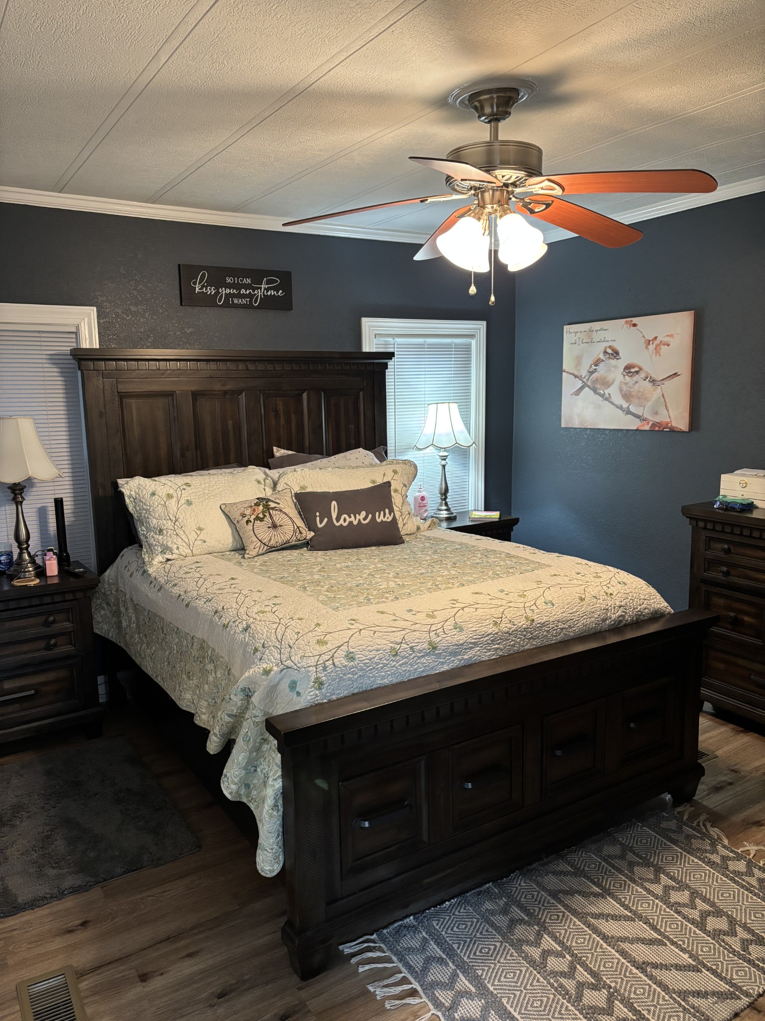 375 Nickajack Trail Monteagle, TN 37356 - Photo 28 of 34 a bedroom with a large bed and a chandelier