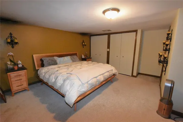 a view of a yard with palm trees