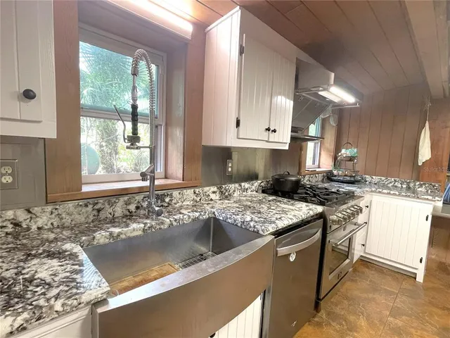 a bathroom with a shower and a toilet