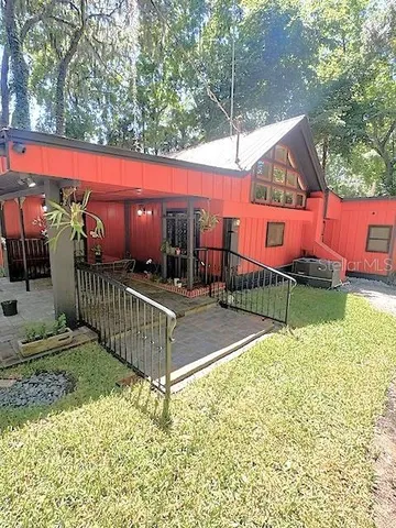 a living room with chairs