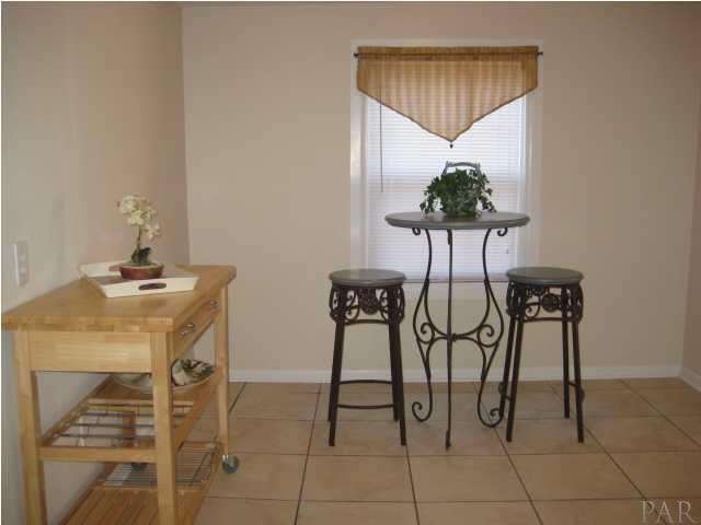9 Milton Road Pensacola, FL 32507 - Photo 6 of 12 Breakfast area. Table and side board remain.