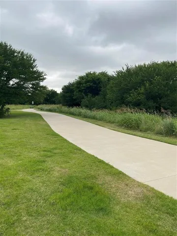 a view of a golf course with a lake