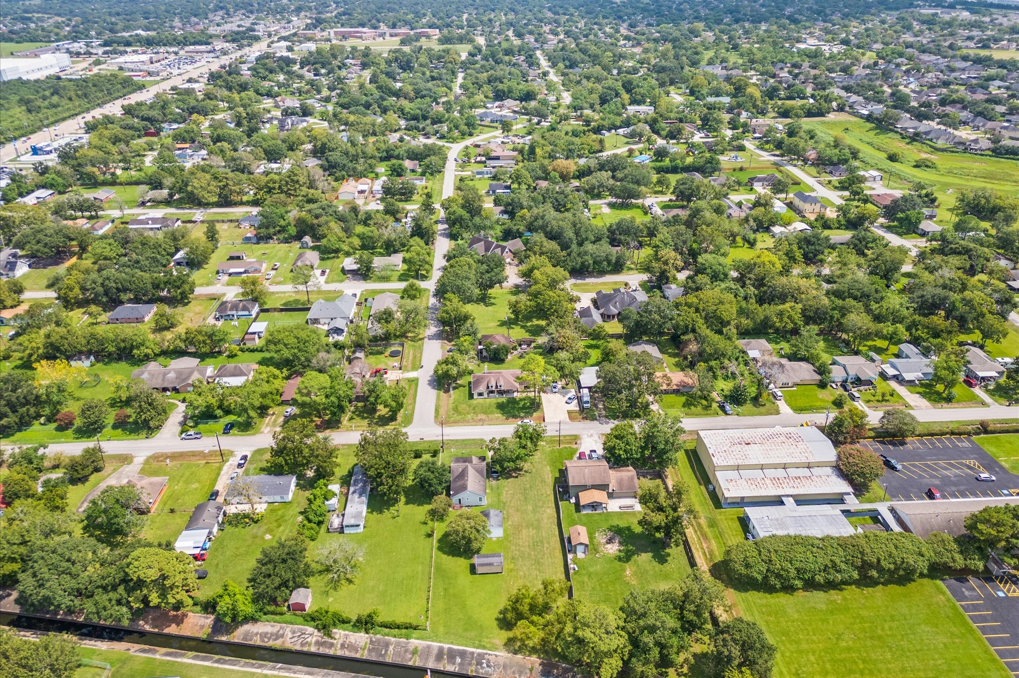 3256 Bernard Street La Porte, TX 77571 - Photo 10 of 17 an aerial view of residential houses with outdoor space and trees