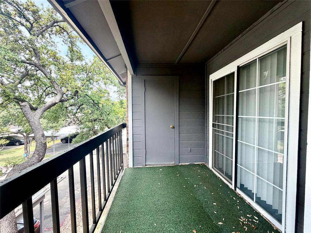 18333 Roehampton Drive, Unit 624 Dallas, TX 75252 - Photo 25 of 39 a view of small yard from a window