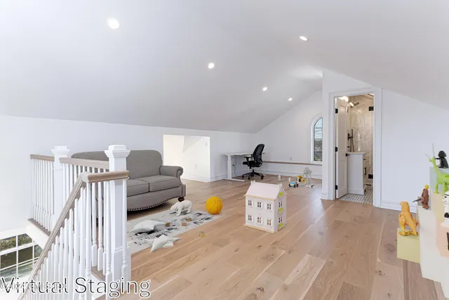 a living room with furniture and window