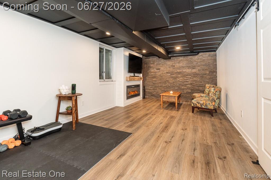 1222 Kings Cove Court, Unit 244 Rochester, MI 48306 - Photo 26 of 44 Finished room in basement 21x12 has LVP floor, recessed lights!