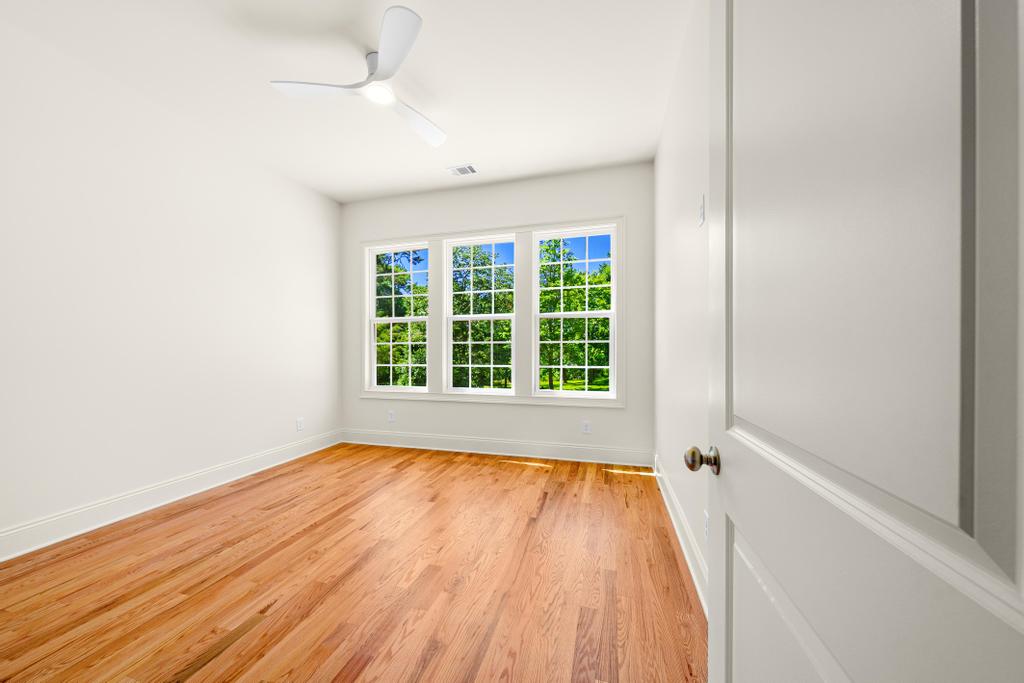 707 Vickery Street Extension Hartwell, GA 30643 - Photo 26 of 50 Hardwood floors and generous windows create a light and airy private space.