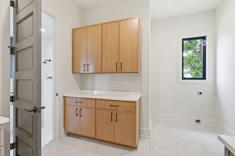 a bathroom with a bathtub and shower