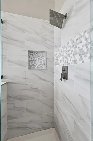 a bathroom with a sink and mirror