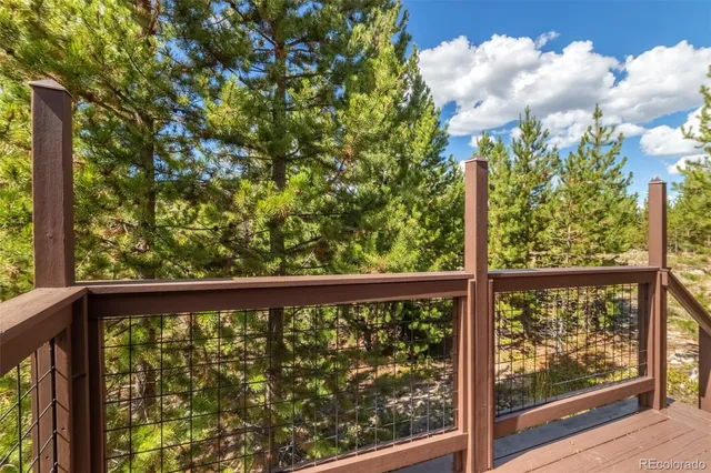 a view of a garden from a balcony