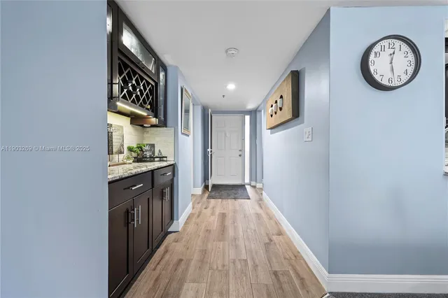 a view of a hallway with elevator