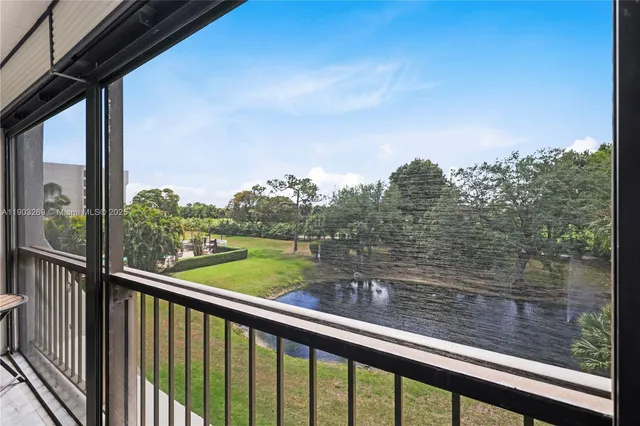 a view of a lake from a balcony