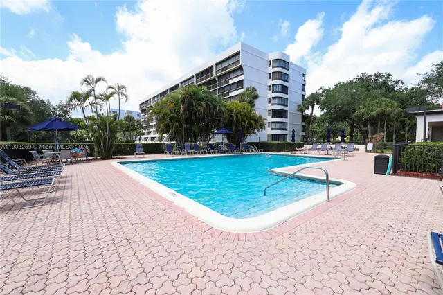 swimming pool with outdoor seating