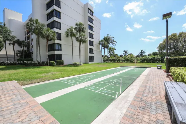 a view of swimming pool with a yard