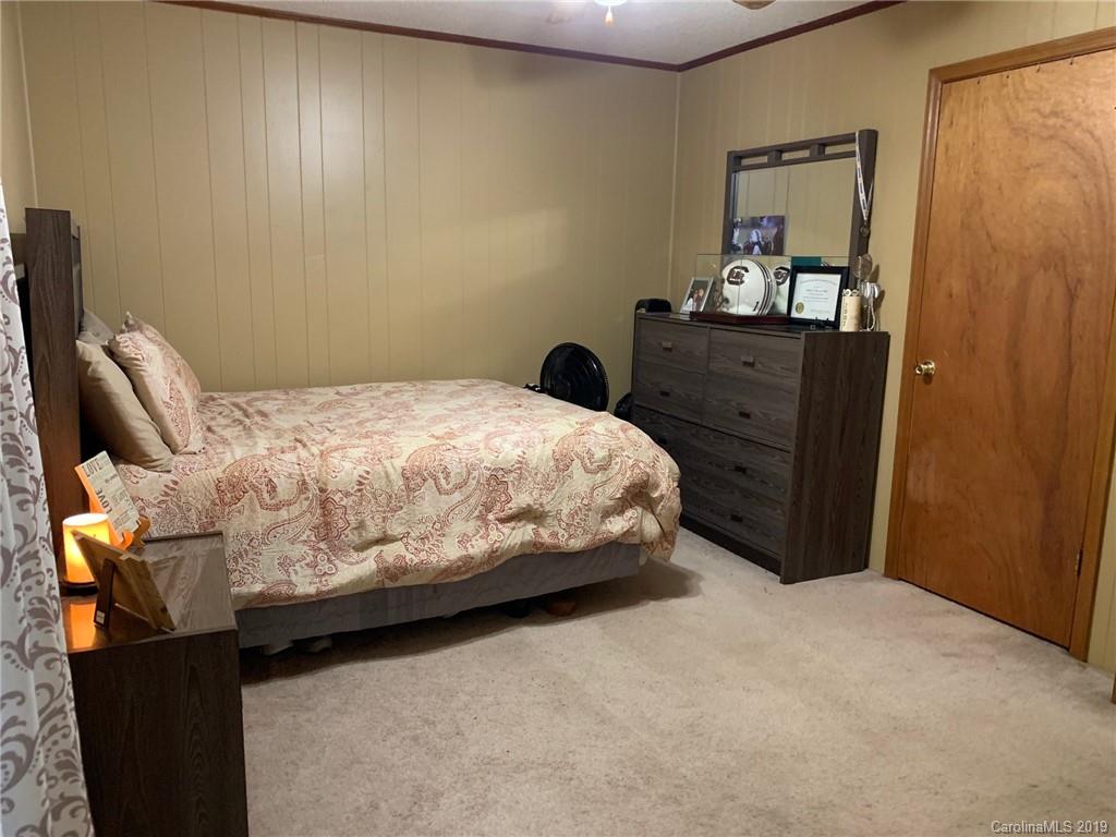 530 South Potter Road Lancaster, SC 29720 - Photo 14 of 21 a bedroom with a bed and dresser