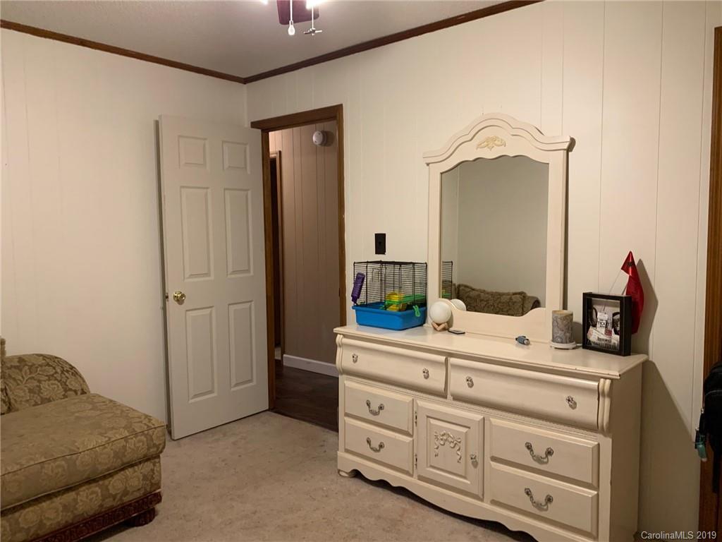 530 South Potter Road Lancaster, SC 29720 - Photo 15 of 21 a room with a dresser and a mirror