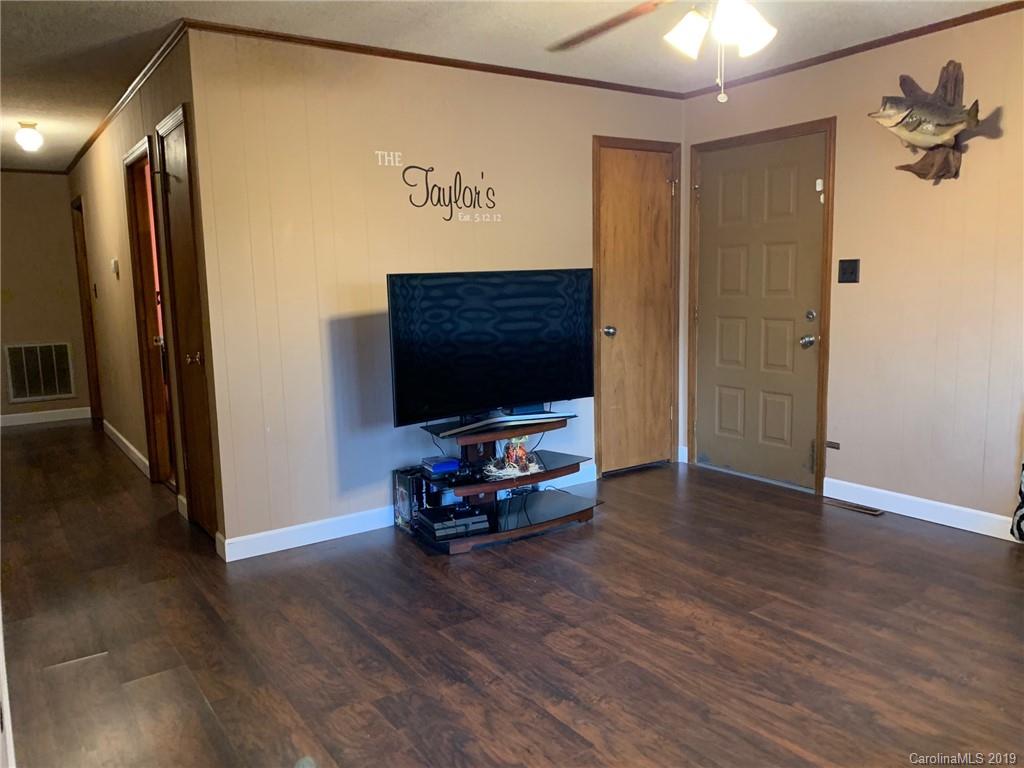 530 South Potter Road Lancaster, SC 29720 - Photo 10 of 21 a living room with furniture and a flat screen tv