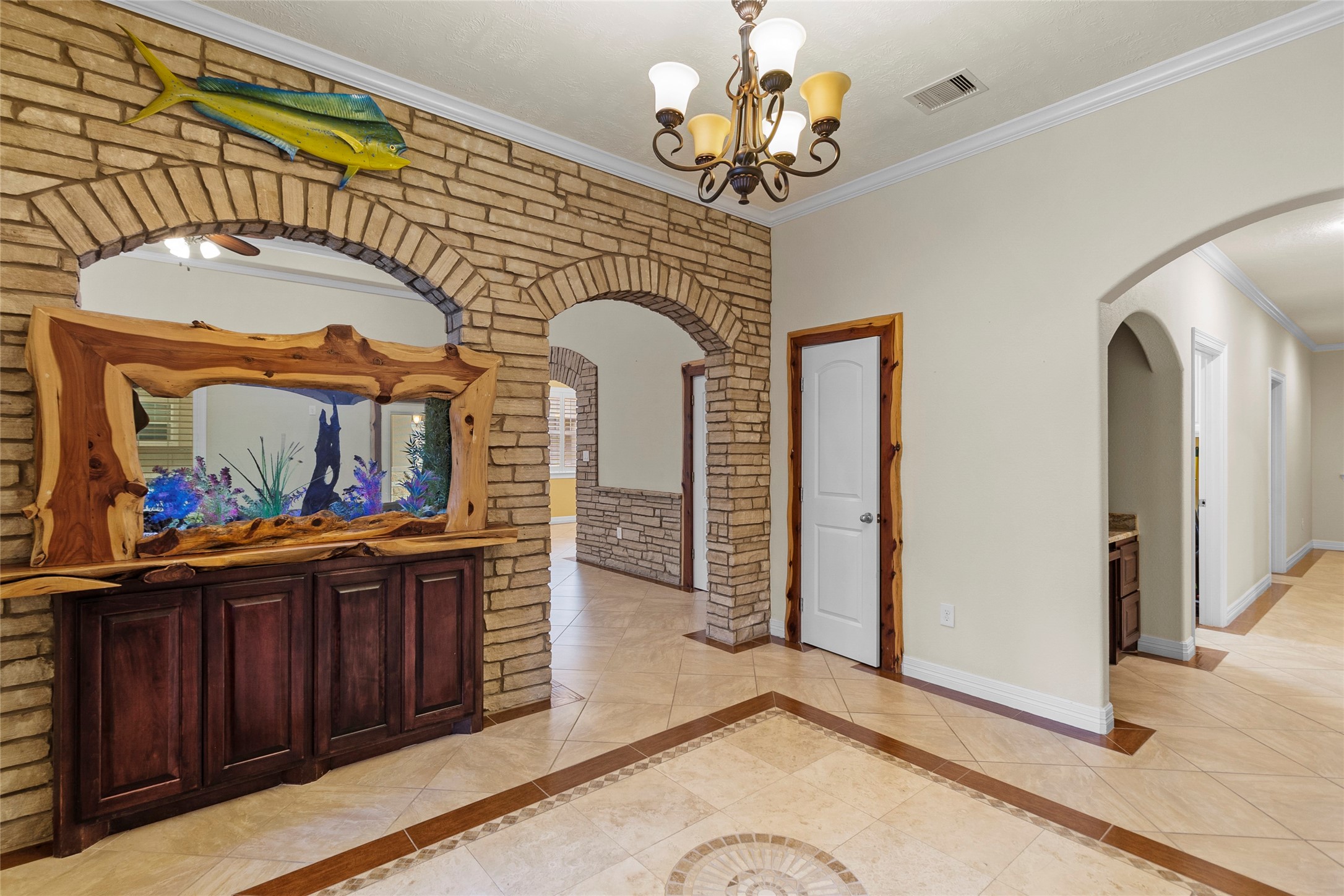 22321 Mossy Oaks Road Spring, TX 77389 - Photo 11 of 50 an entryway with a chandelier