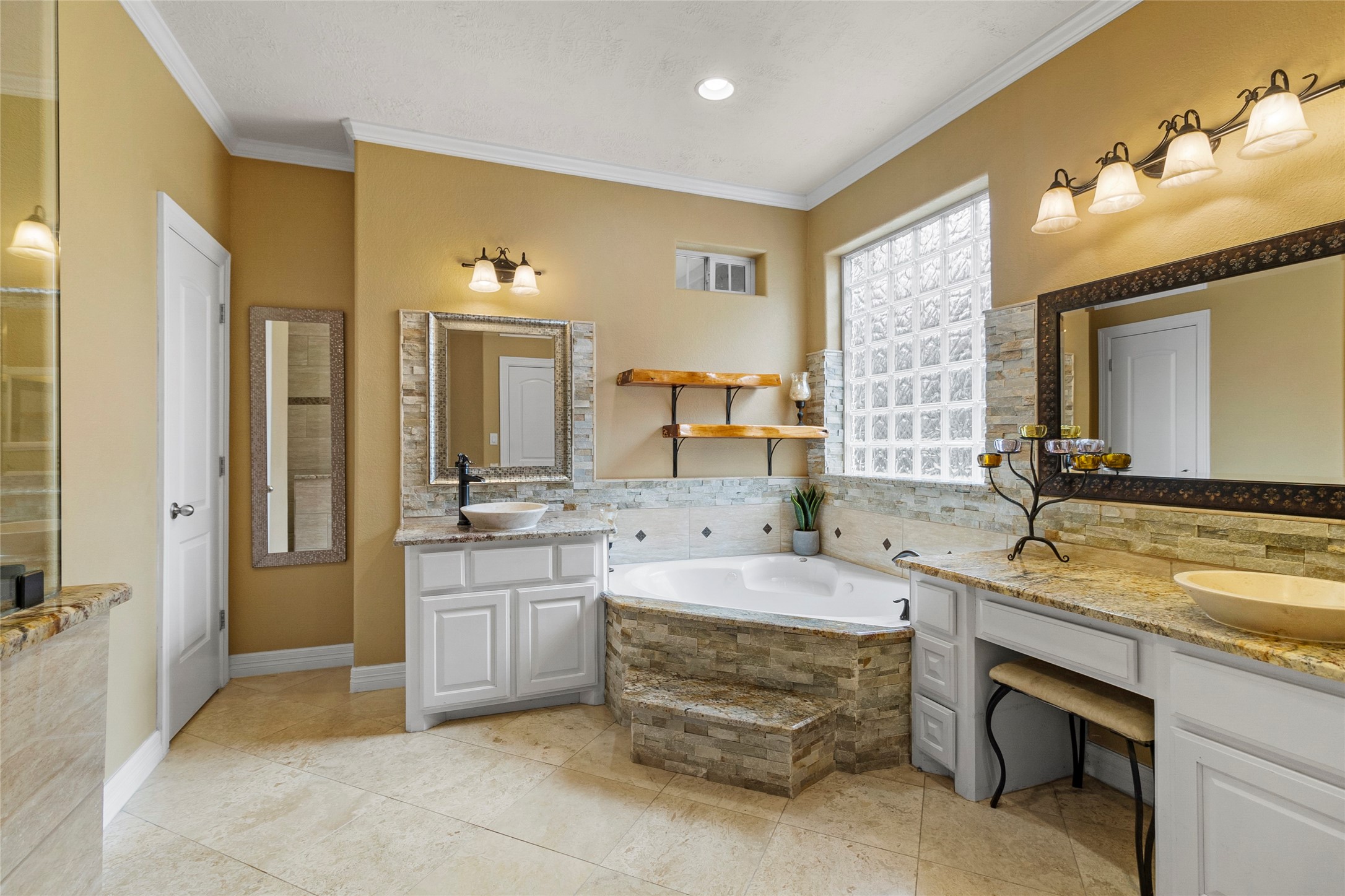 22321 Mossy Oaks Road Spring, TX 77389 - Photo 18 of 50 a bathroom with a granite countertop double vanity sink and a mirror