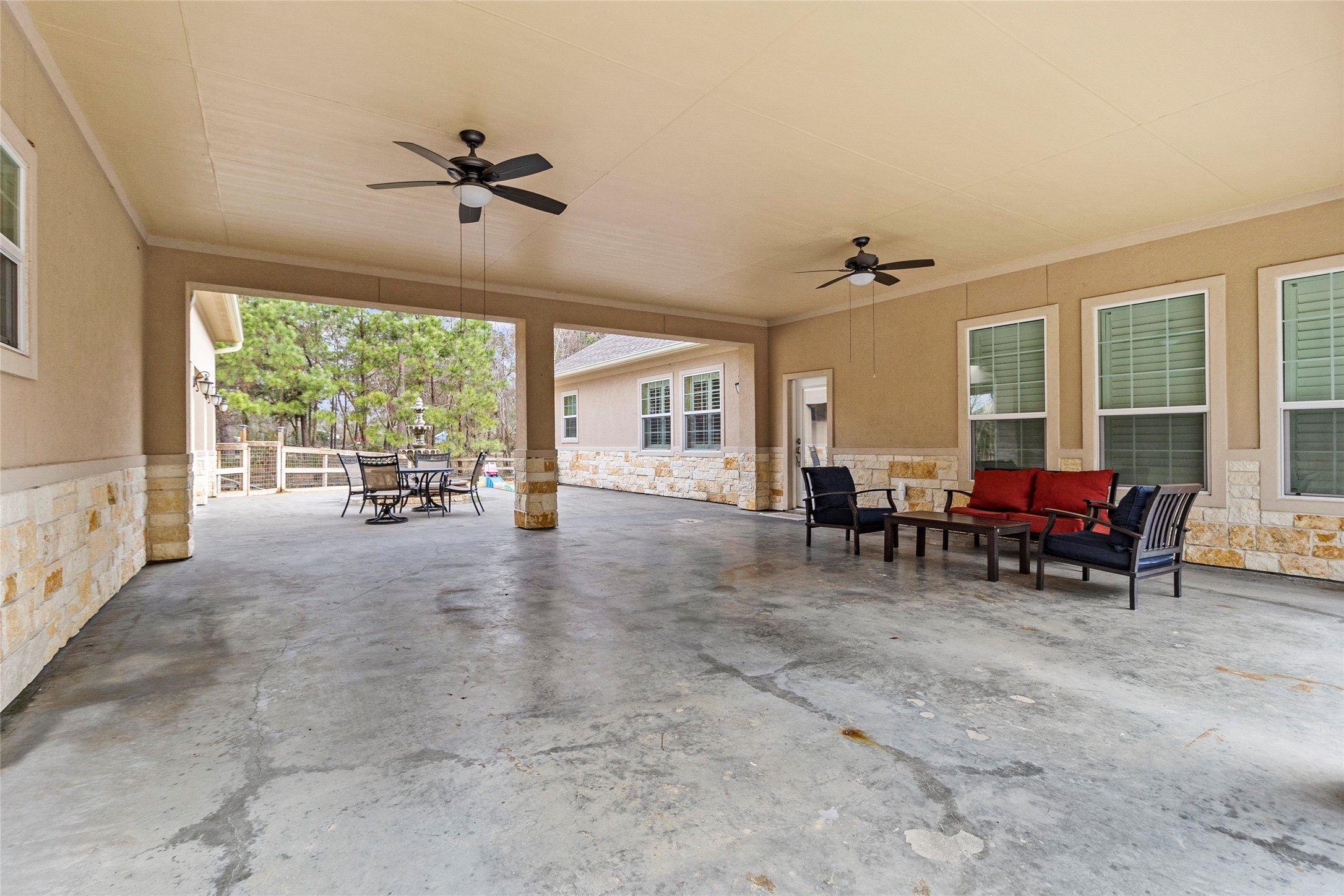 22321 Mossy Oaks Road Spring, TX 77389 - Photo 19 of 50 a view of a livingroom with furniture water view and windows