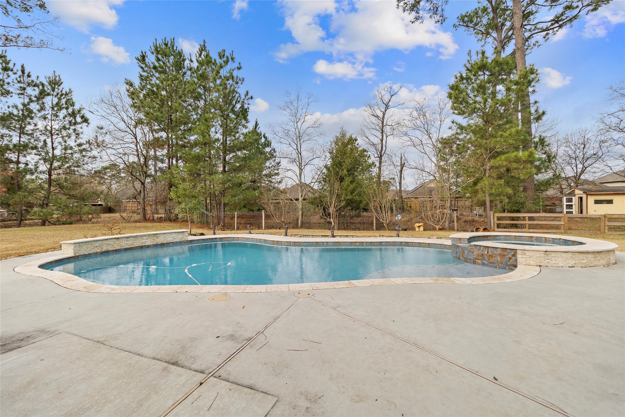 22321 Mossy Oaks Road Spring, TX 77389 - Photo 21 of 50 a view of outdoor space with swimming pool and yard