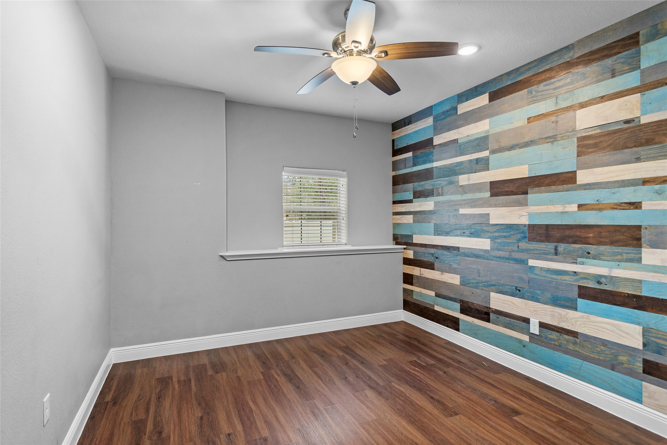 22321 Mossy Oaks Road Spring, TX 77389 - Photo 25 of 50 a view of room with window and wooden floor