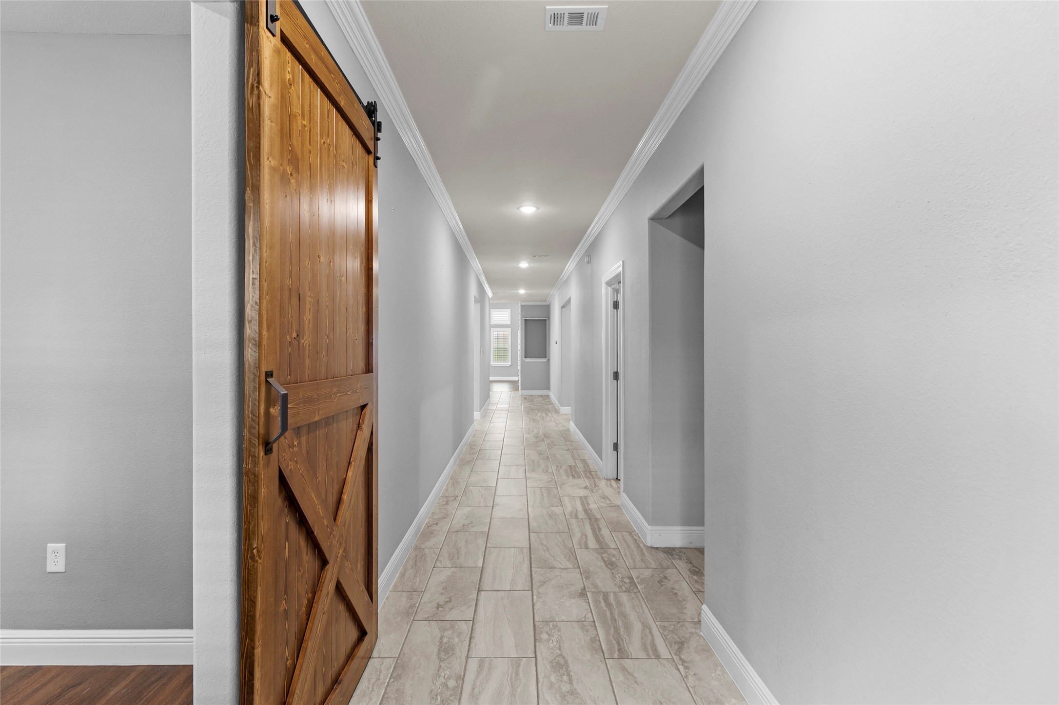 22321 Mossy Oaks Road Spring, TX 77389 - Photo 26 of 50 a view of hallway with wooden floor