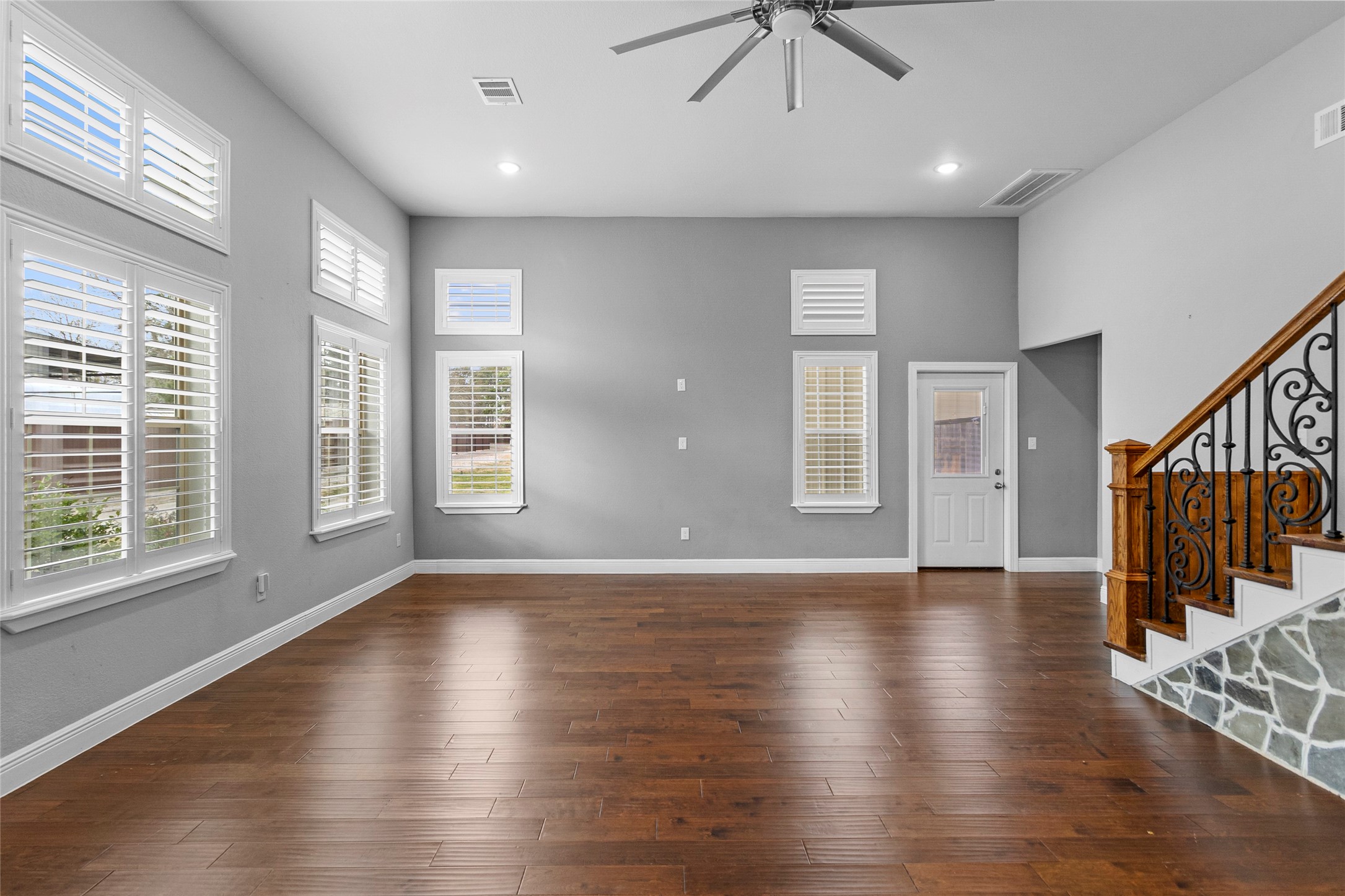 22321 Mossy Oaks Road Spring, TX 77389 - Photo 30 of 50 a view of an empty room with wooden floor and a window