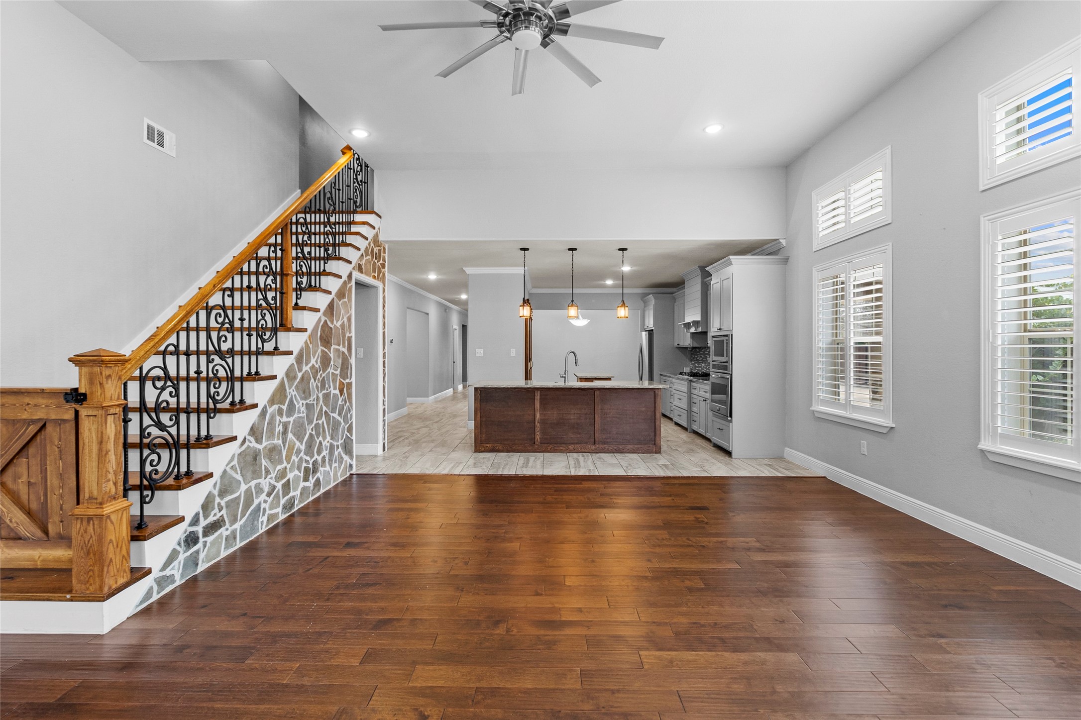 22321 Mossy Oaks Road Spring, TX 77389 - Photo 31 of 50 an entryway in a hall with a window and wooden floor