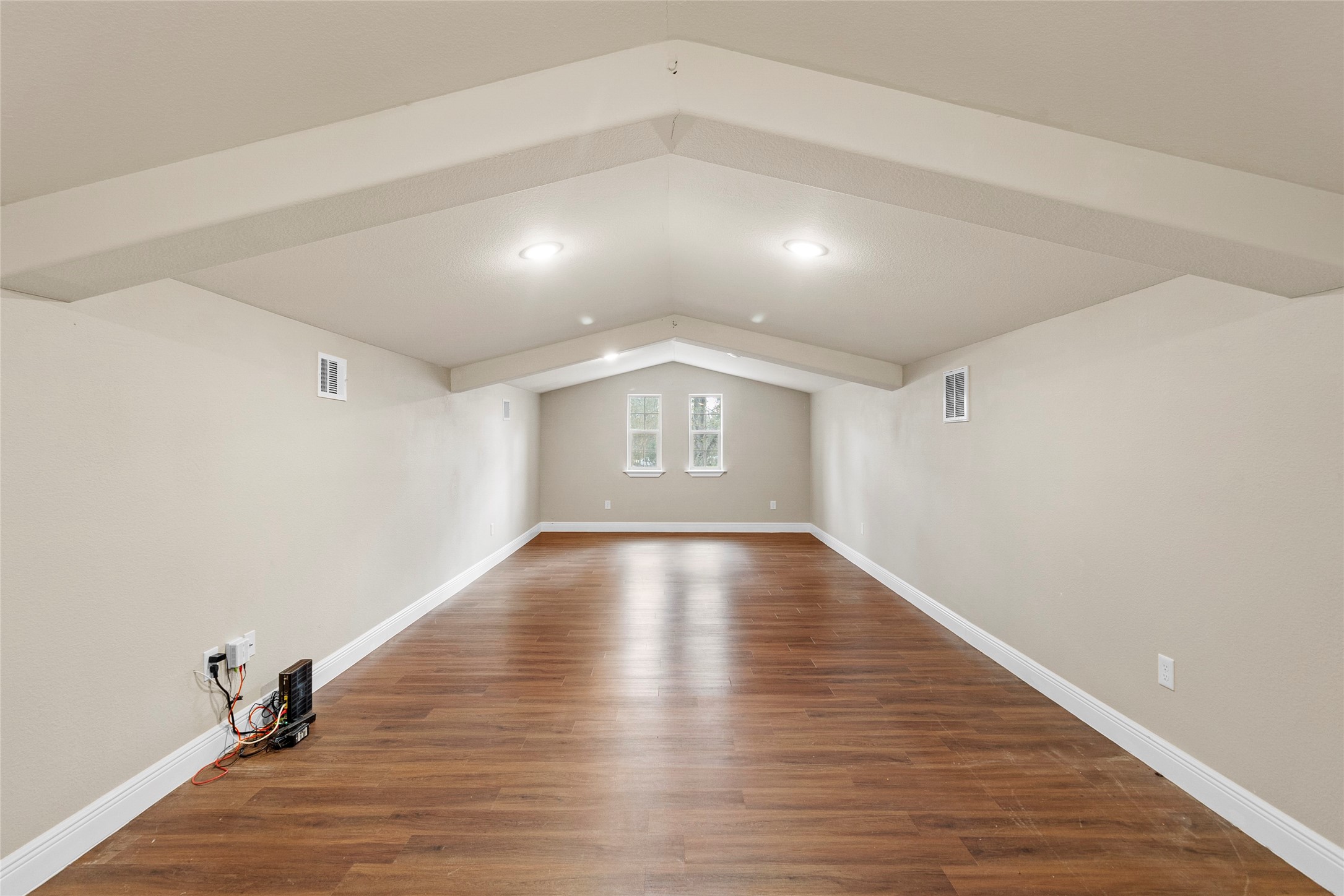 22321 Mossy Oaks Road Spring, TX 77389 - Photo 32 of 50 wooden floor in an empty room with a window