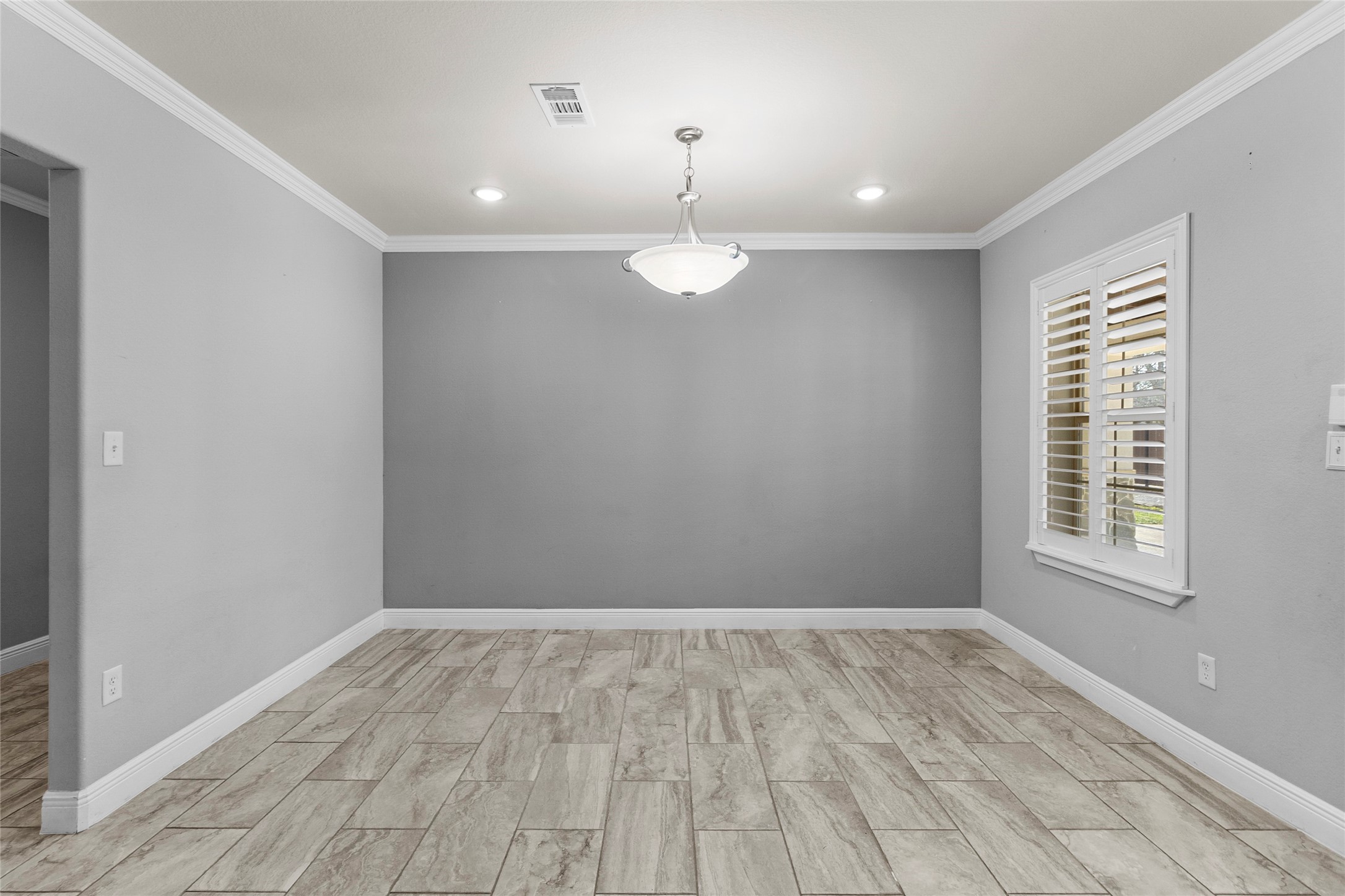 22321 Mossy Oaks Road Spring, TX 77389 - Photo 38 of 50 wooden floor in an empty room with a window