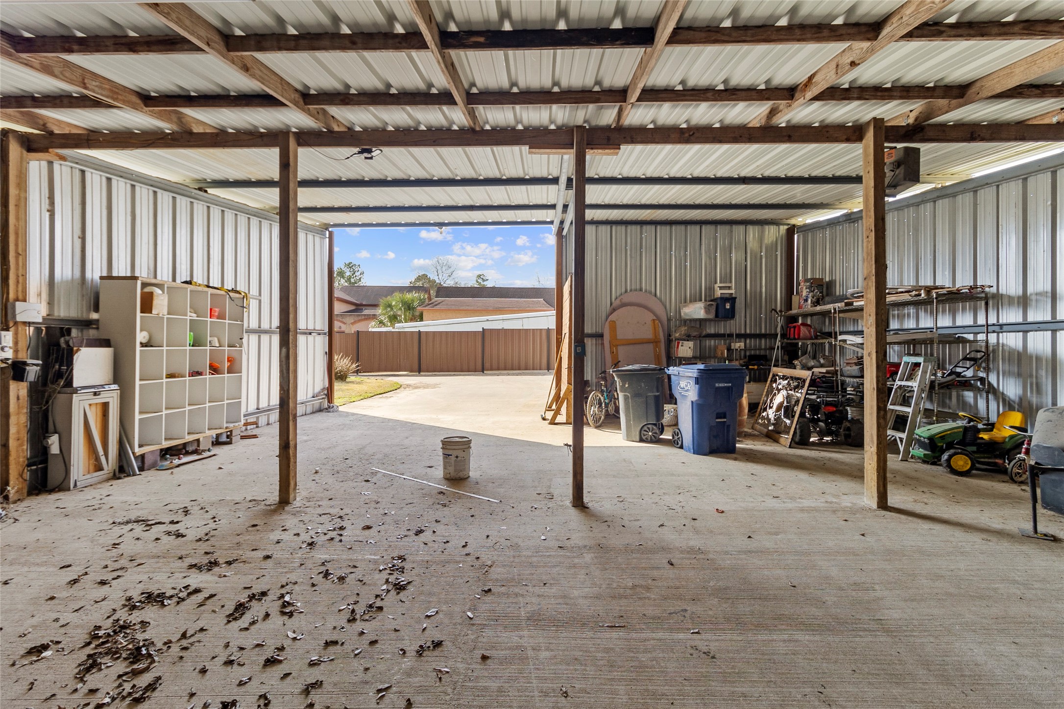 22321 Mossy Oaks Road Spring, TX 77389 - Photo 43 of 50 a view of a garage with gym equipment