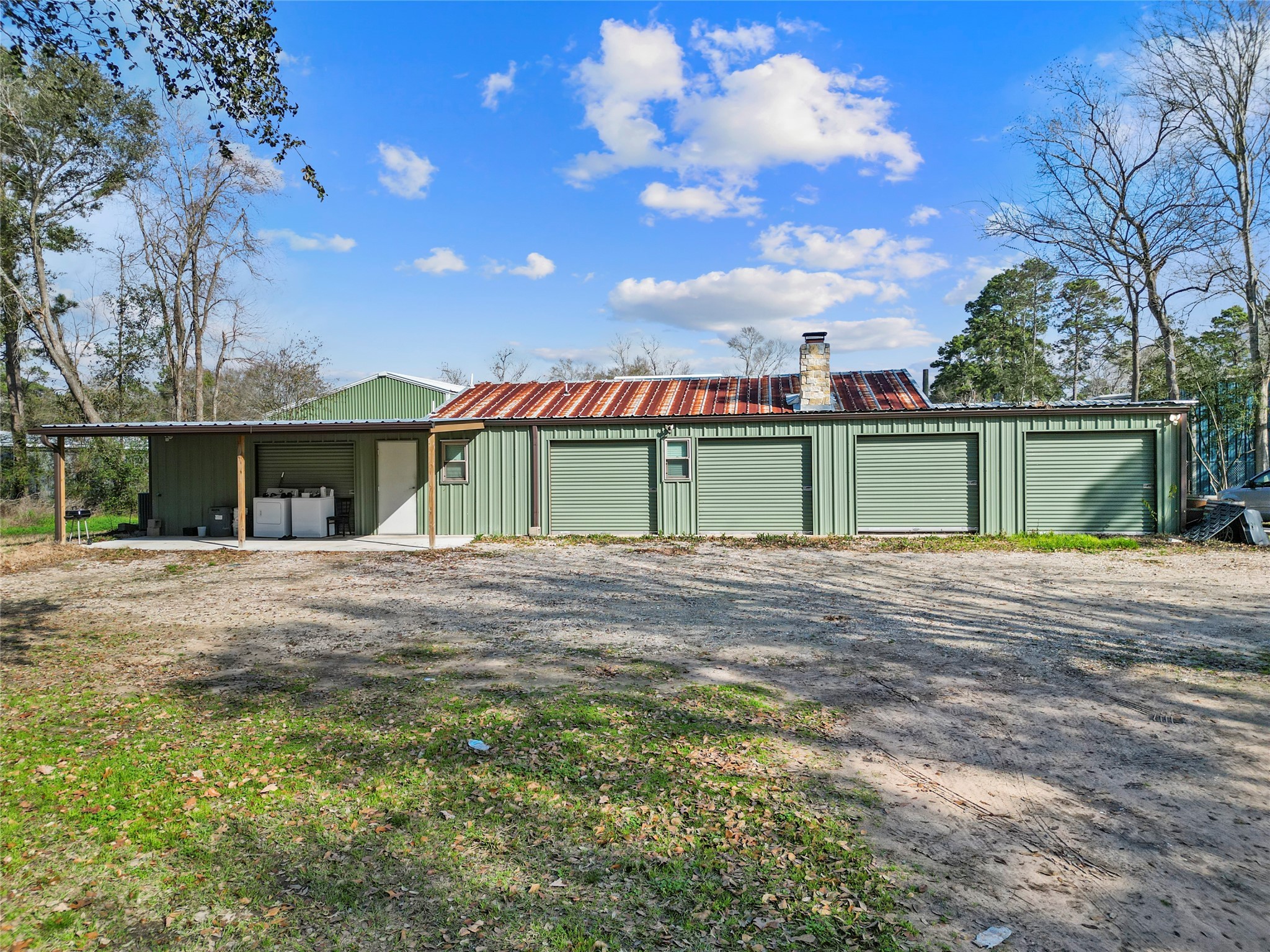 22321 Mossy Oaks Road Spring, TX 77389 - Photo 48 of 50 a view of a yard in front of a house with a large tree