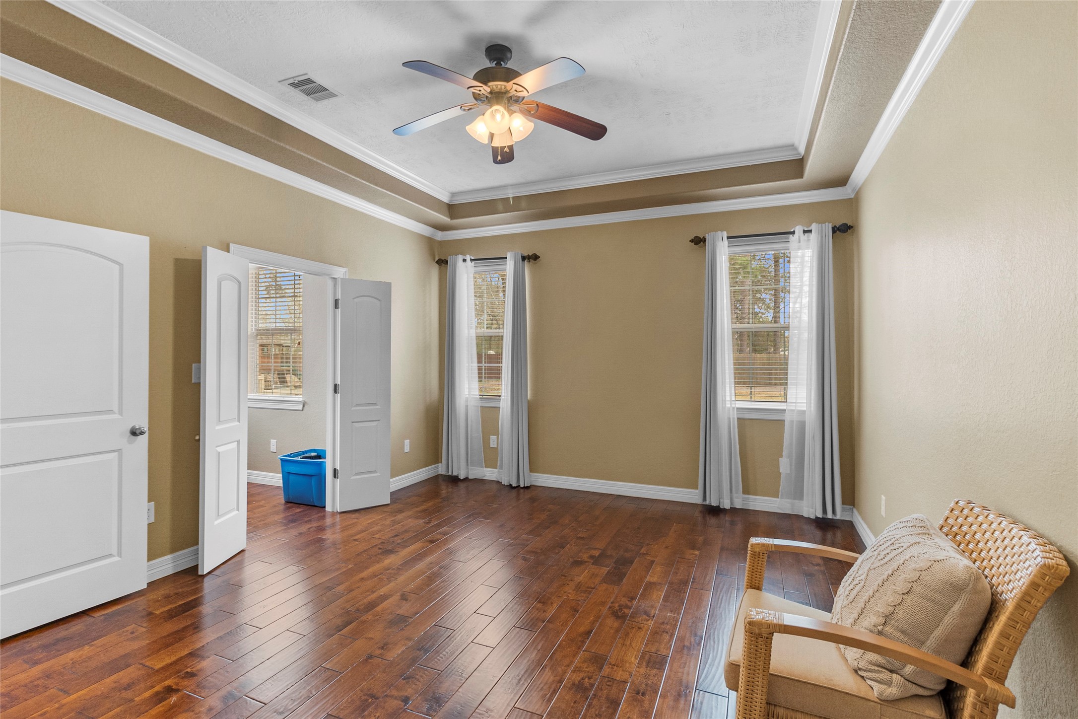 22321 Mossy Oaks Road Spring, TX 77389 - Photo 5 of 50 a view of room with hardwood floor and ceiling fan