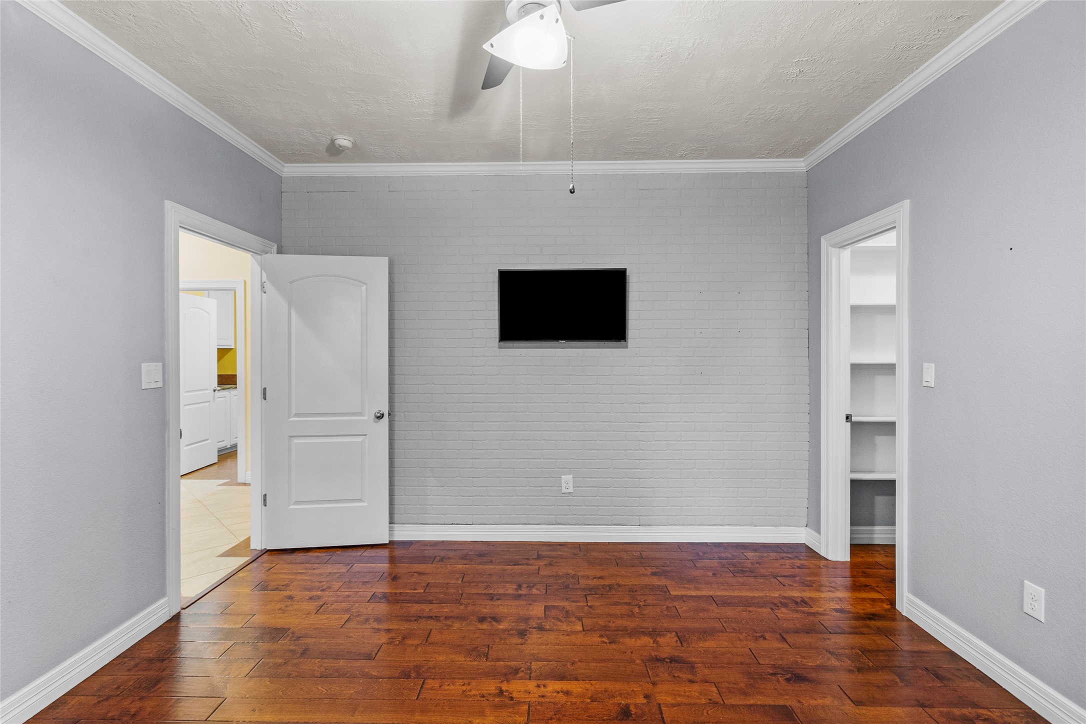 22321 Mossy Oaks Road Spring, TX 77389 - Photo 6 of 50 a view of an empty room with wooden floor