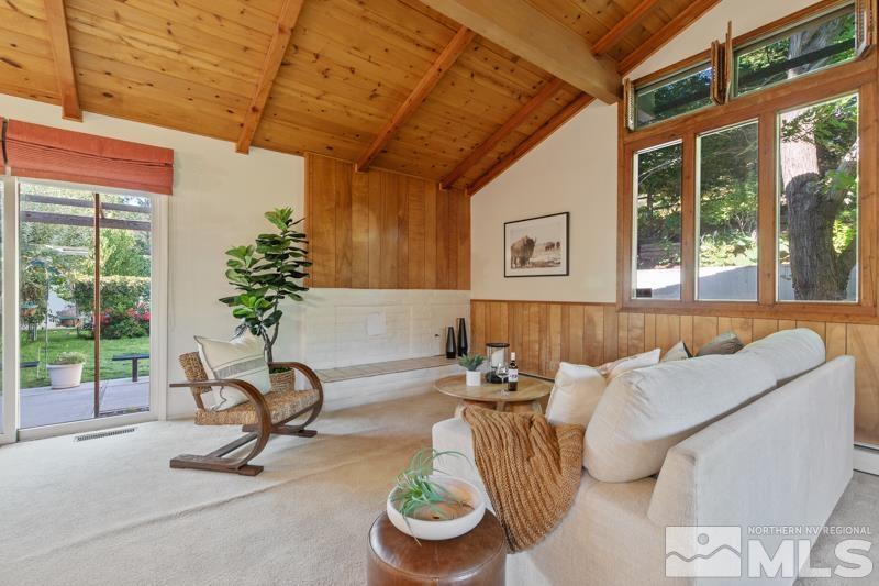 2301 Crescent Circle Reno, NV 89509 - Photo 14 of 40 a living room with furniture and a potted plant