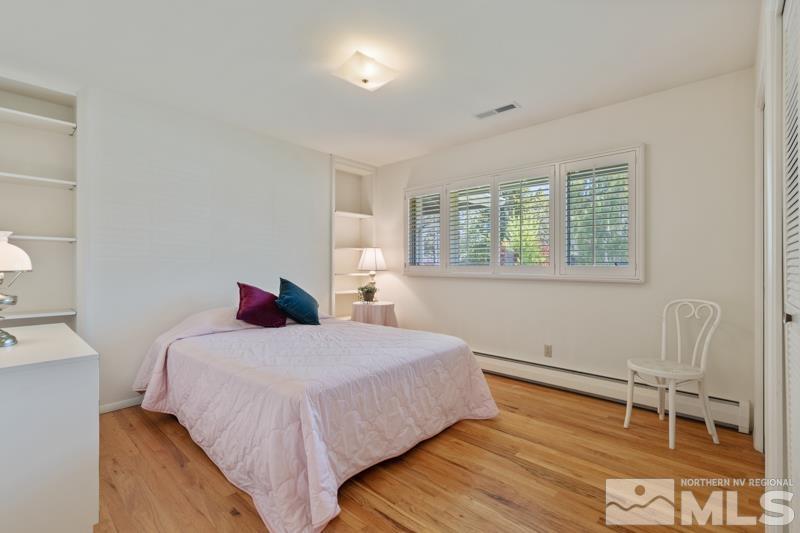 2301 Crescent Circle Reno, NV 89509 - Photo 21 of 40 a bedroom with a bed and a window