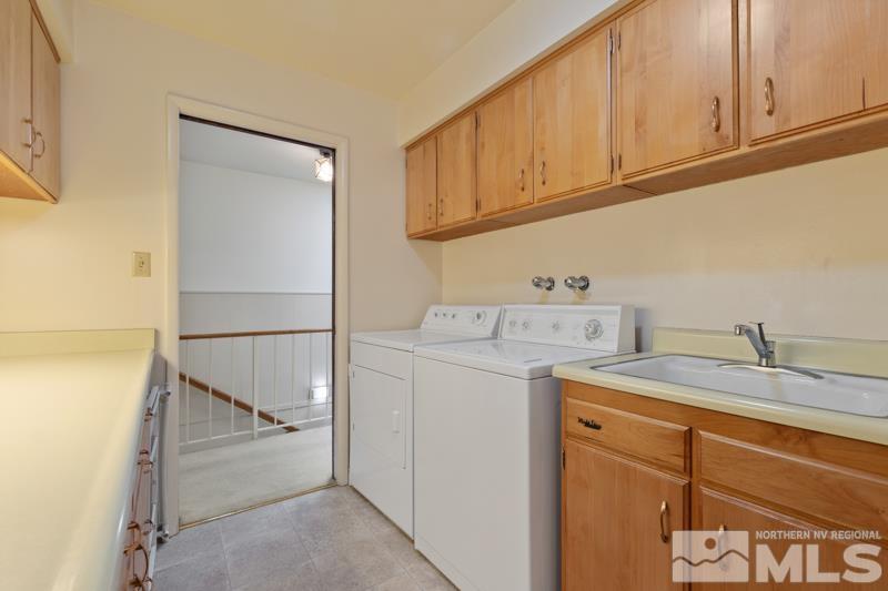 2301 Crescent Circle Reno, NV 89509 - Photo 26 of 40 a utility room with dryer and washer