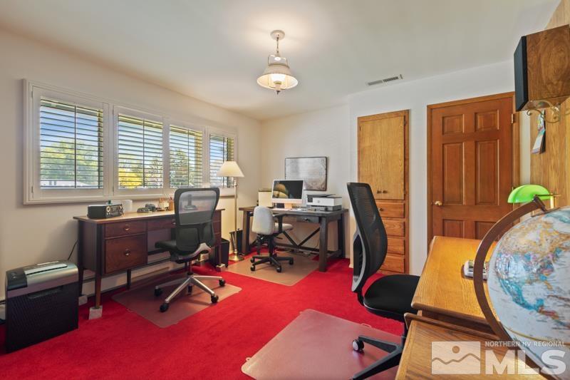 2301 Crescent Circle Reno, NV 89509 - Photo 29 of 40 a view of a workspace with furniture and a window