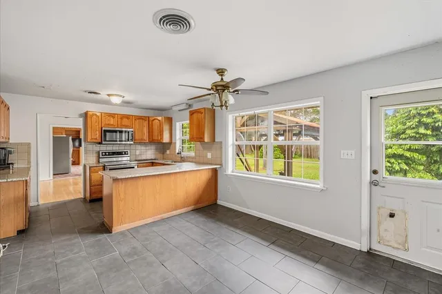 a large living room with a large window