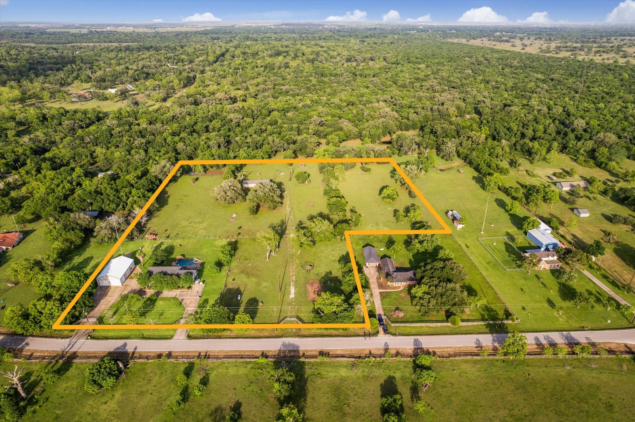 3515 County Road 36 Angleton, TX 77515 - Photo 1 of 50 an aerial view of residential houses with outdoor space