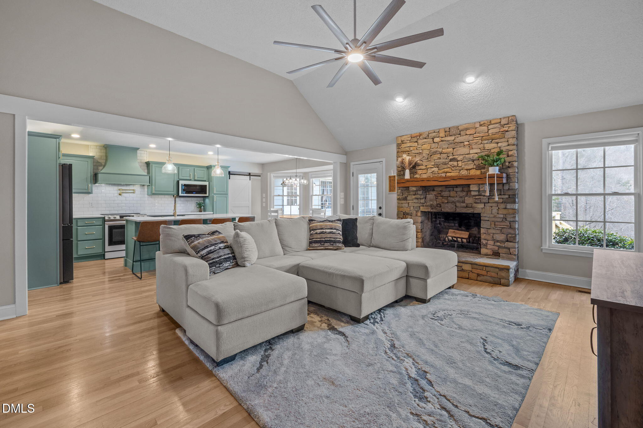 2008 Red Mountain Road Rougemont, NC 27572 - Photo 3 of 31 a living room with furniture and a fireplace