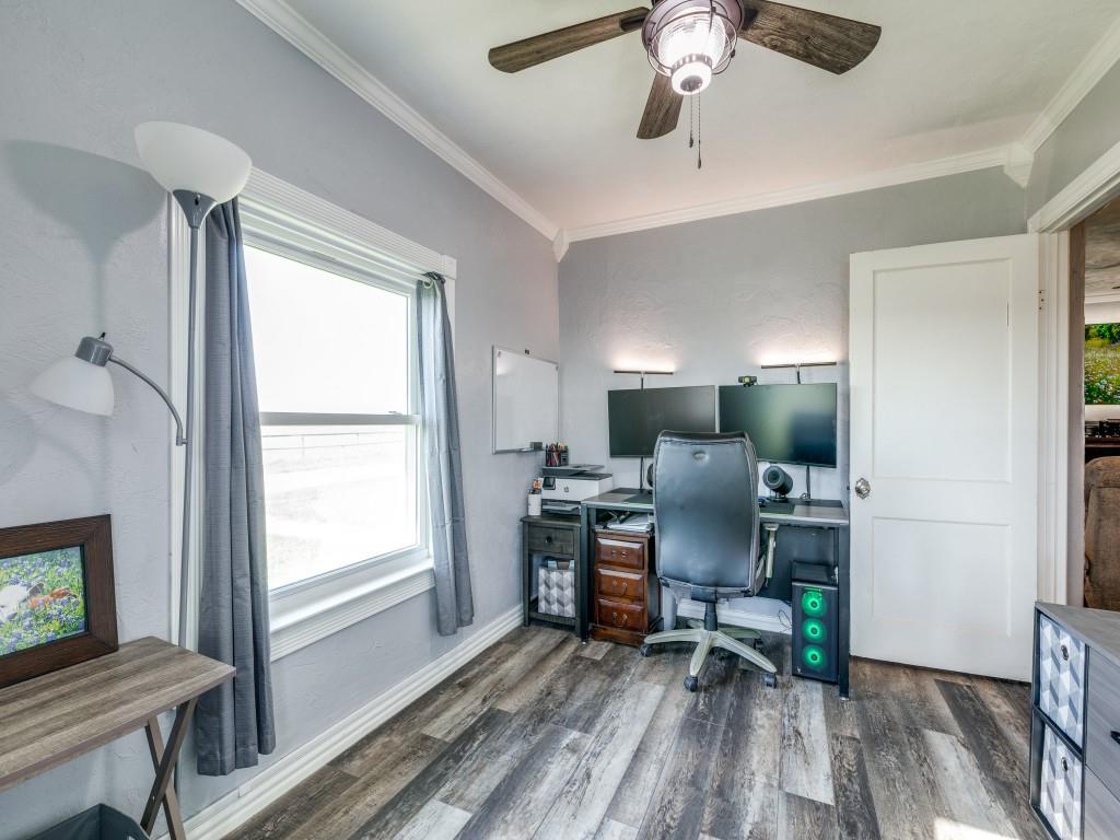3061 Turkey Creek Road Sunset, TX 76270 - Photo 17 of 31 a view of a workspace with furniture and a window