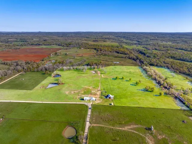 a view of an ocean and a houses